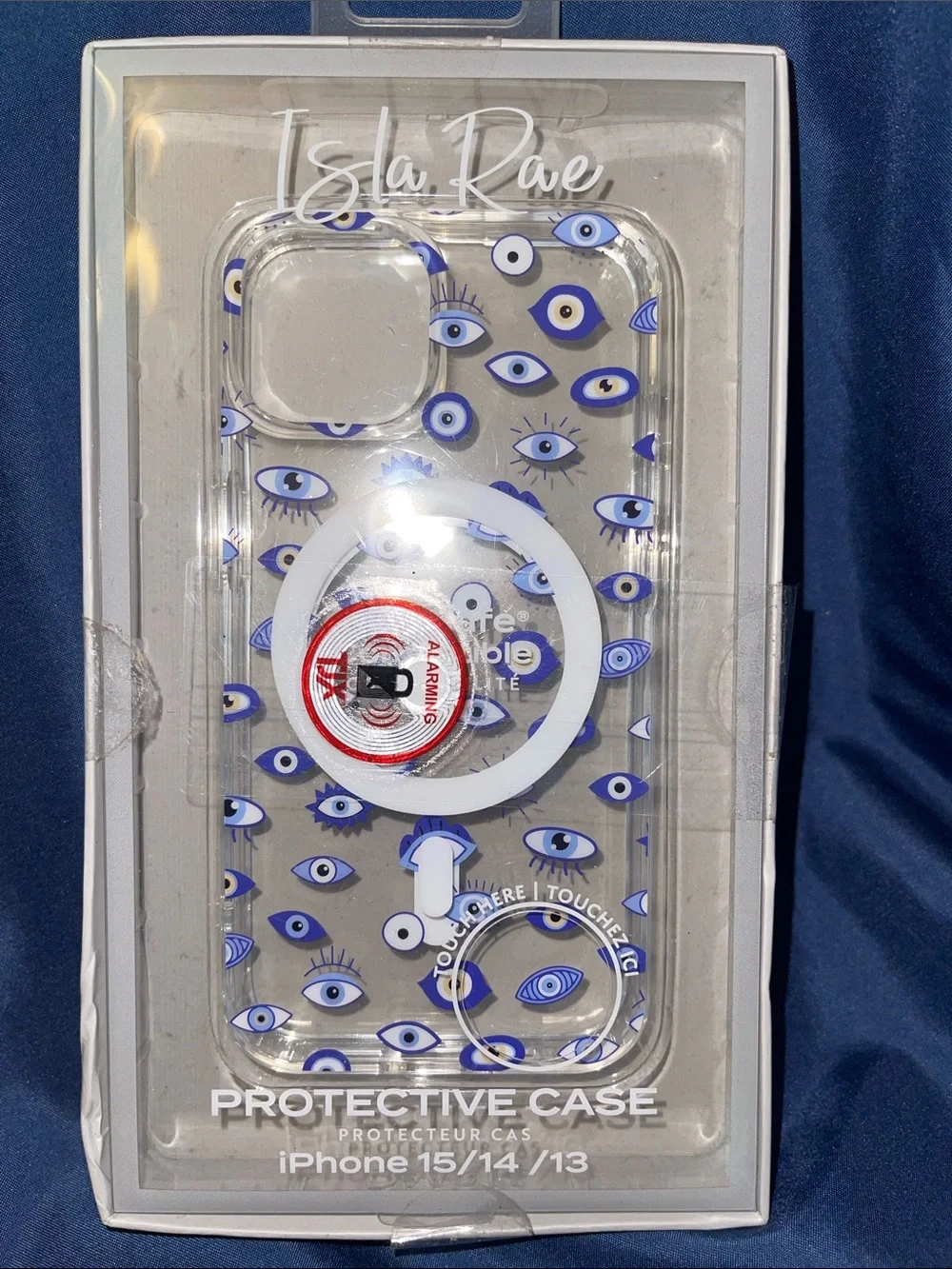 Isla Rae Clear iPhone Case with Blue Eye Pattern and White MagSafe Ring